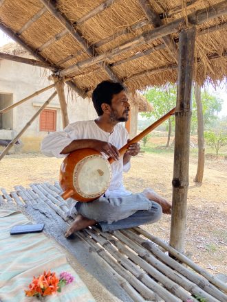 Uttam Das plays my ektara in the Machan. March 2022